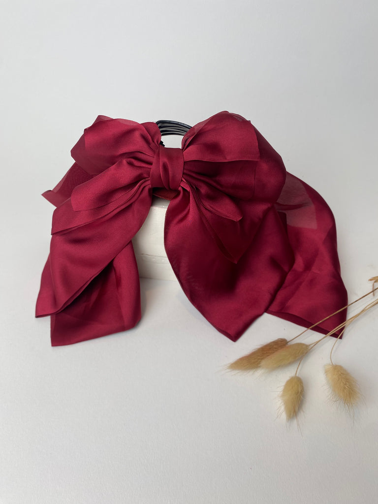 Red claw clip bow