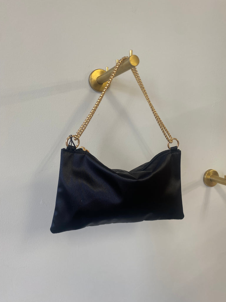 Black satin bag with gold chain