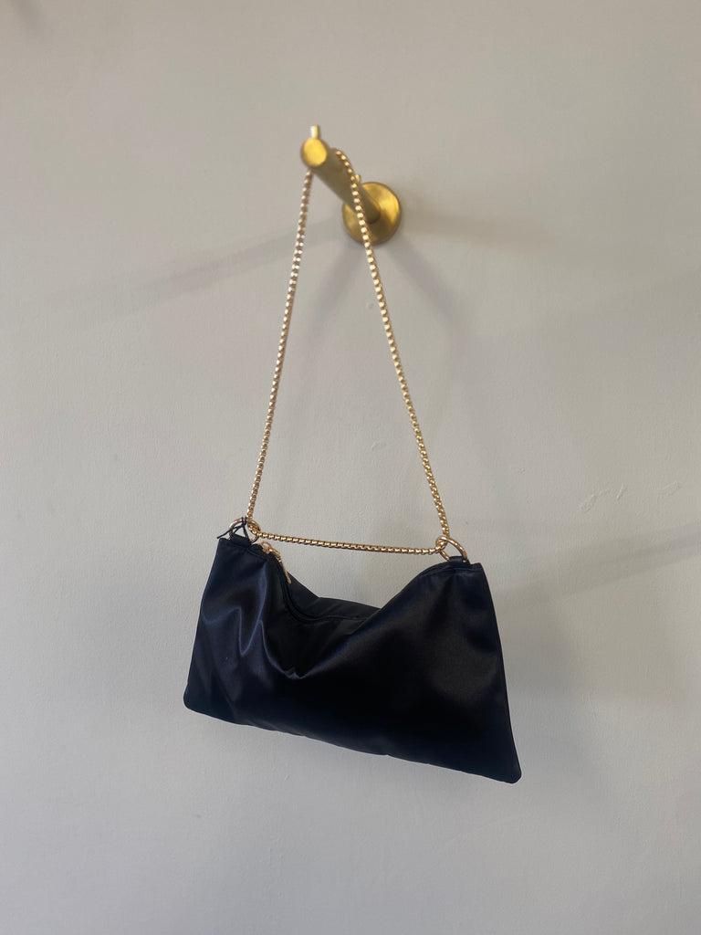 Black satin bag with gold chain