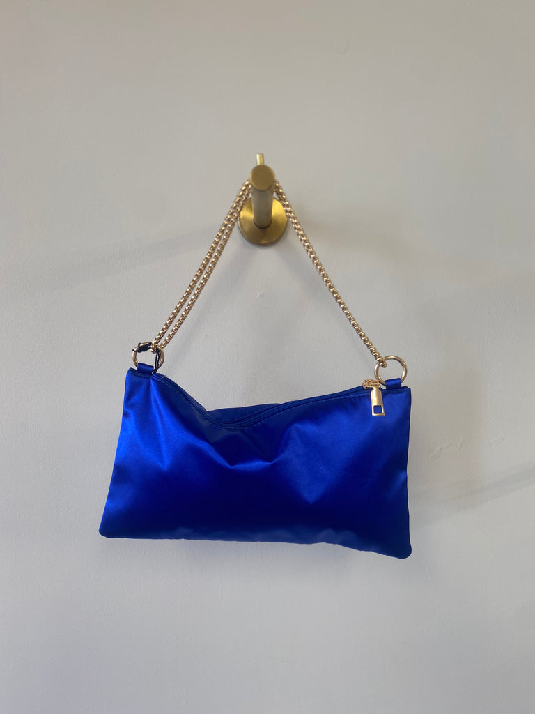 Royal blue satin bag with gold chain
