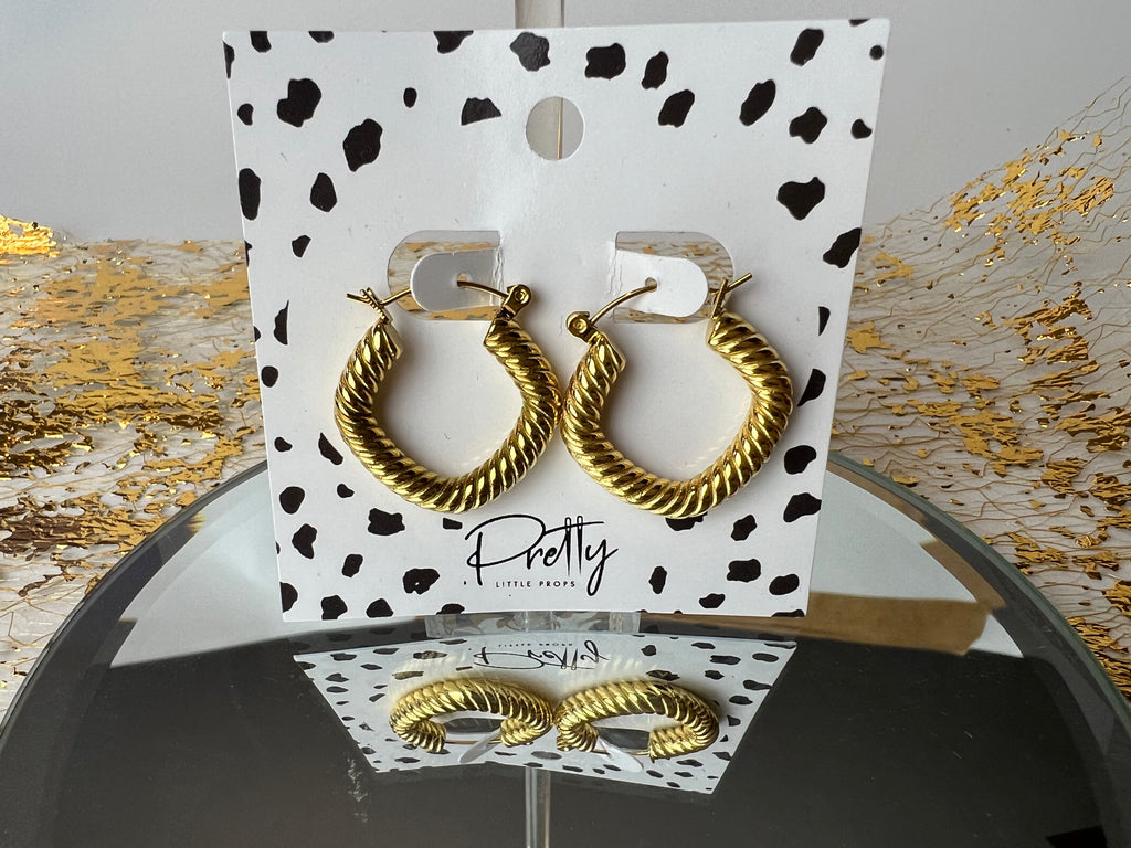 Gold croissant style earrings